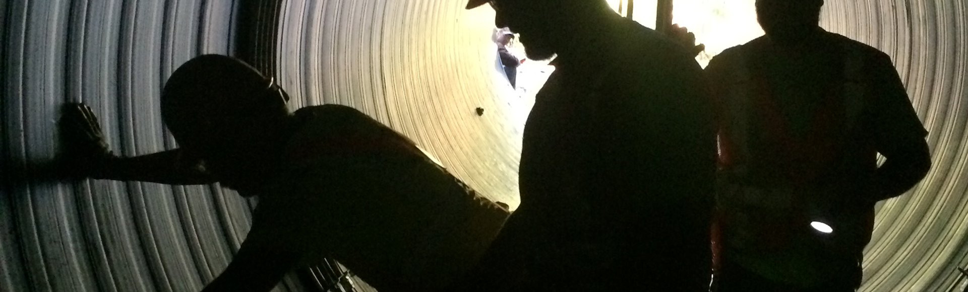 Workers reline a culvert using Contech Engineered Solutions Materials. 