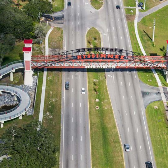 Continental prefabricated pedestrian bridge over a highway. 