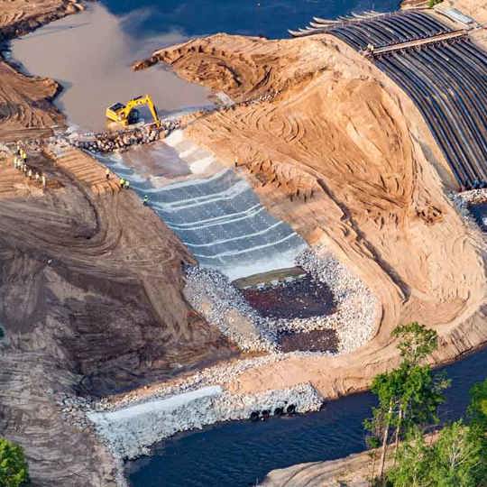  A dam spillway is being lined with Armorflex cellular concrete blocks. 