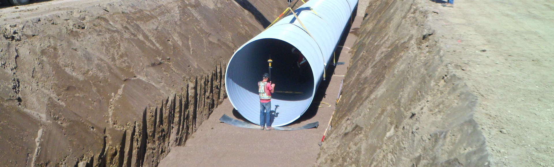 Installation of Contech corrugated metal pipe.