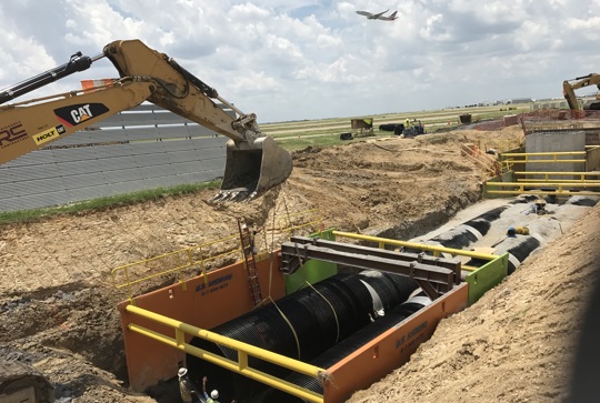 Installation of DuroMaxx steel reinforced polyethylene (SRPE) pipe.