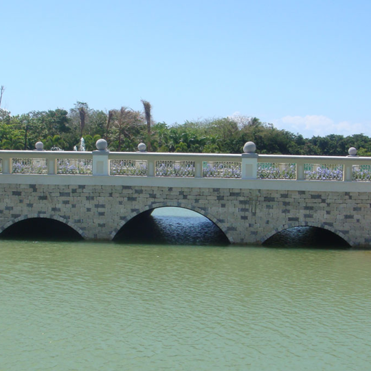 A vehicular bridge over a river made from Contech Aluminum Structural Plate.