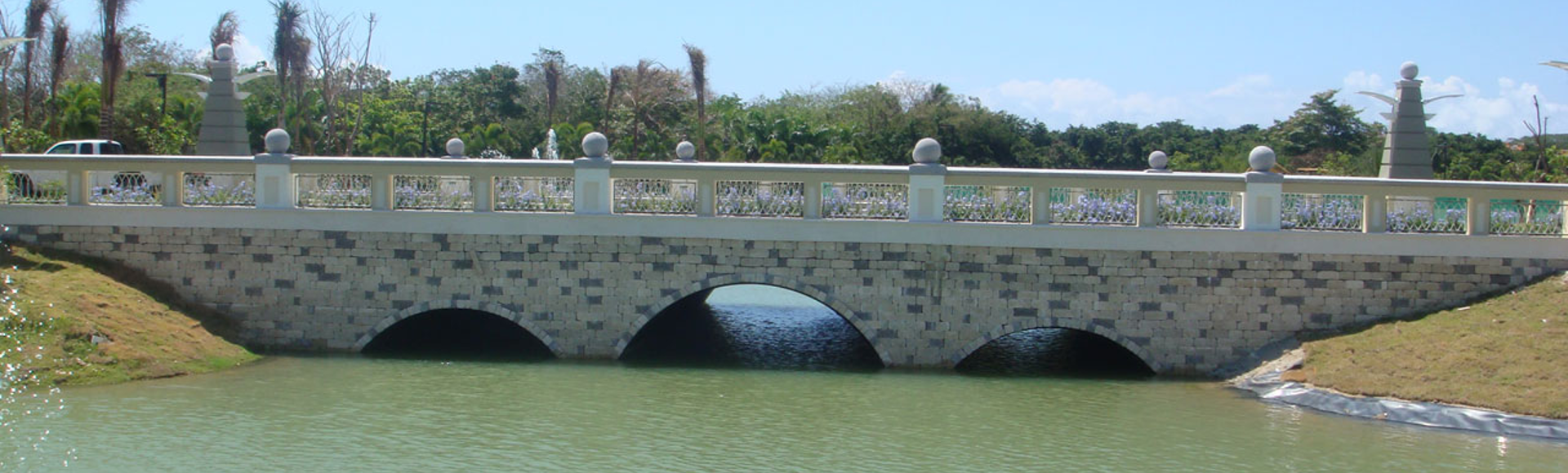 A vehicular bridge over a river made from Contech Aluminum Structural Plate.