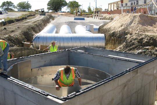 Vortech stormwater treatment combined with an underground CMP detention.