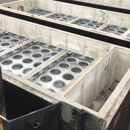 The installation of a Jellyfish Filter stormwater treatment device. 