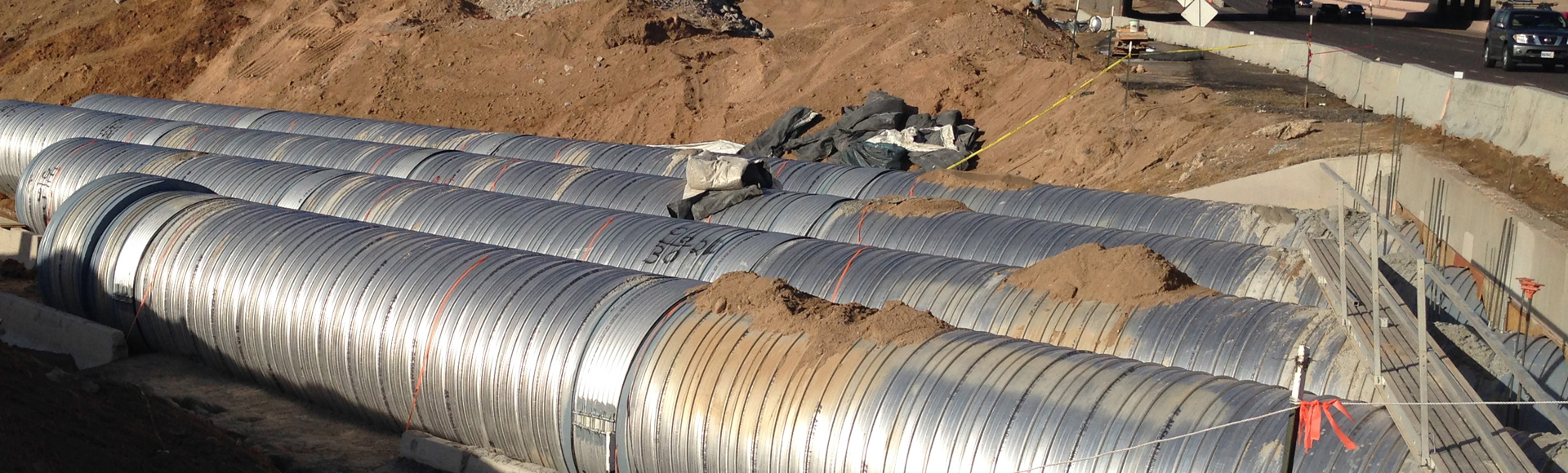 Installation of corrugated metal pipe. 